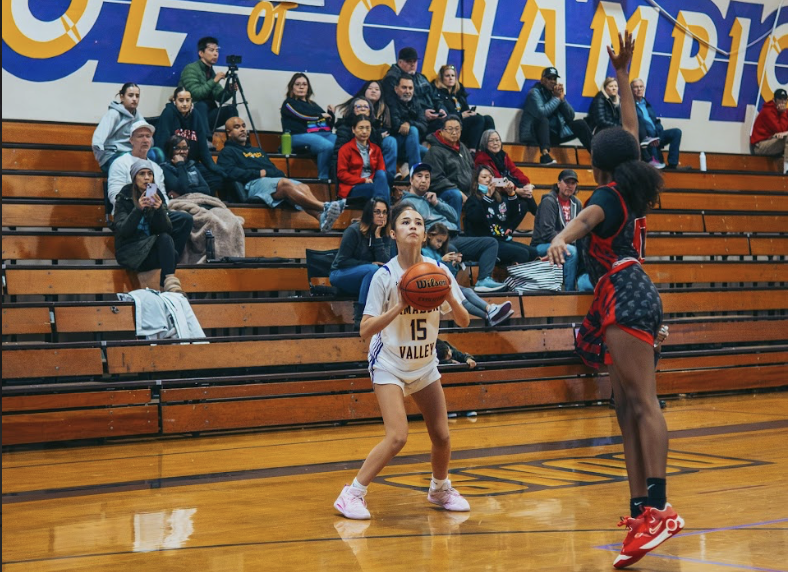 Morgan Adams spots up for an open three pointer in a 54-28 win against Skyline. 